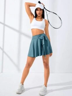 Solid Knot Side Wrap Hem Sports Skort -Gym Chic Wear 1690872800378deebbeb621a115c0474b757d74247 thumbnail 405x552